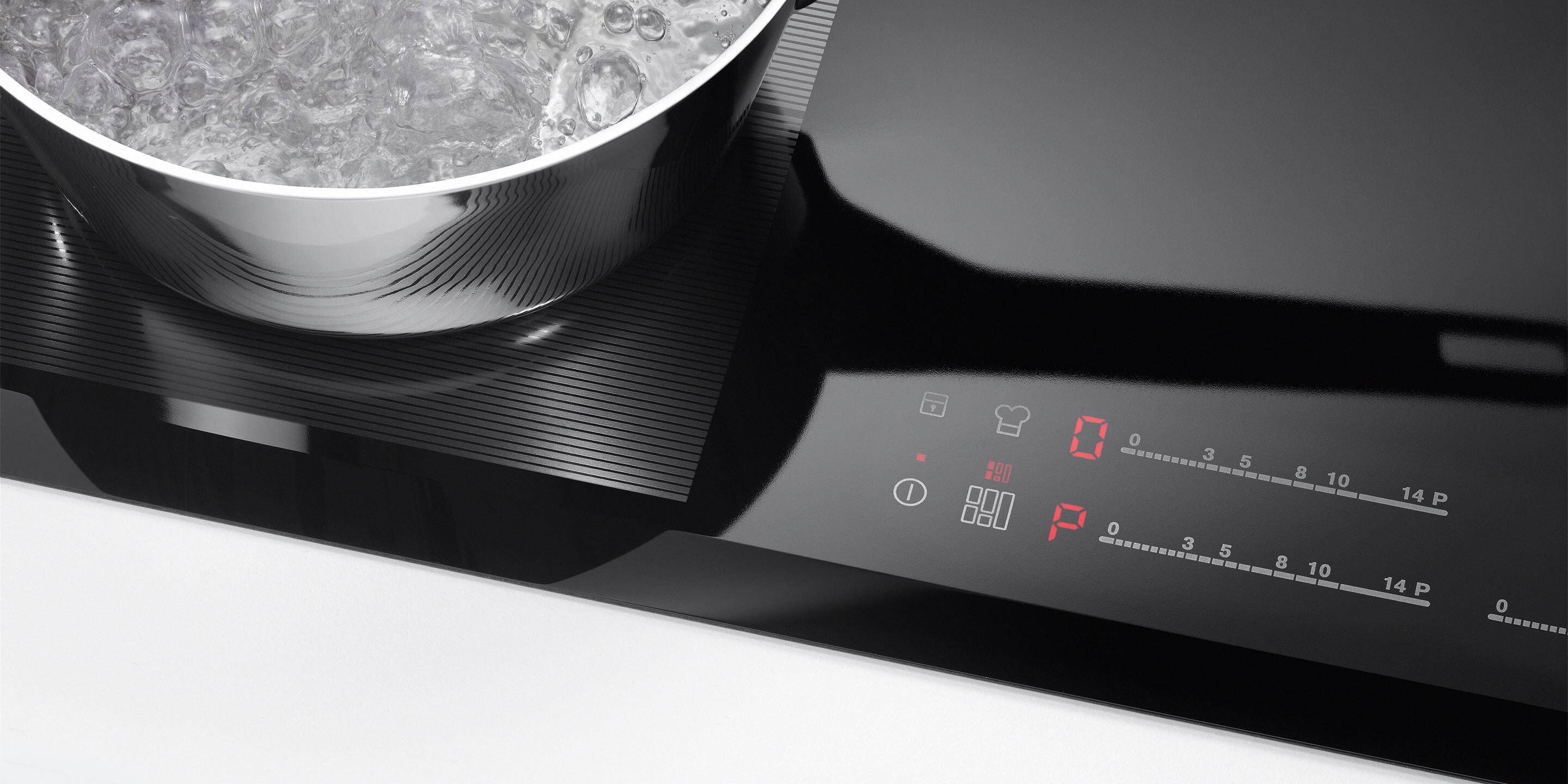 Butoni i nisjes dhe i ndalimit në një pianurë me induksion nga Electrolux